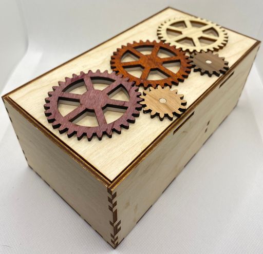 Wooden KeyForge box with three large gears in the lid